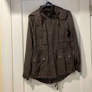 Lightweight hooded utility jacket.